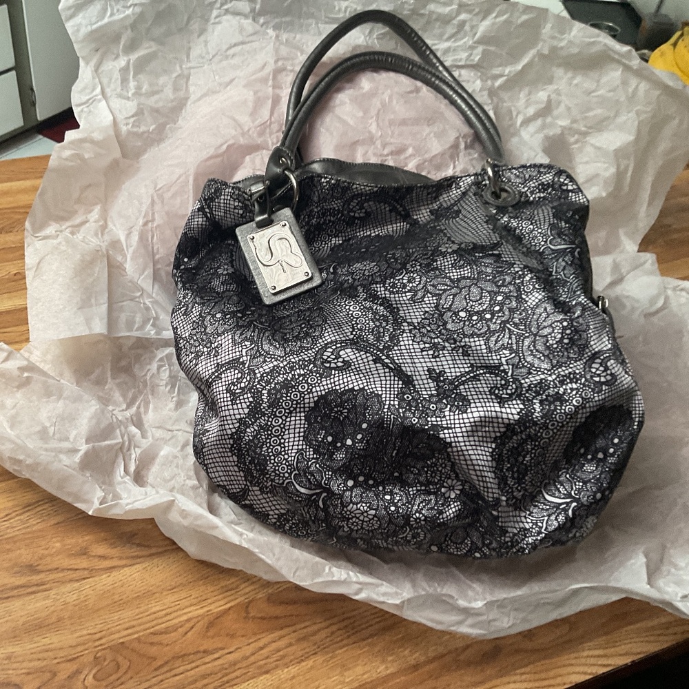 REVERSIBLE HANDBAG..LACE TO FAUX LEATHER